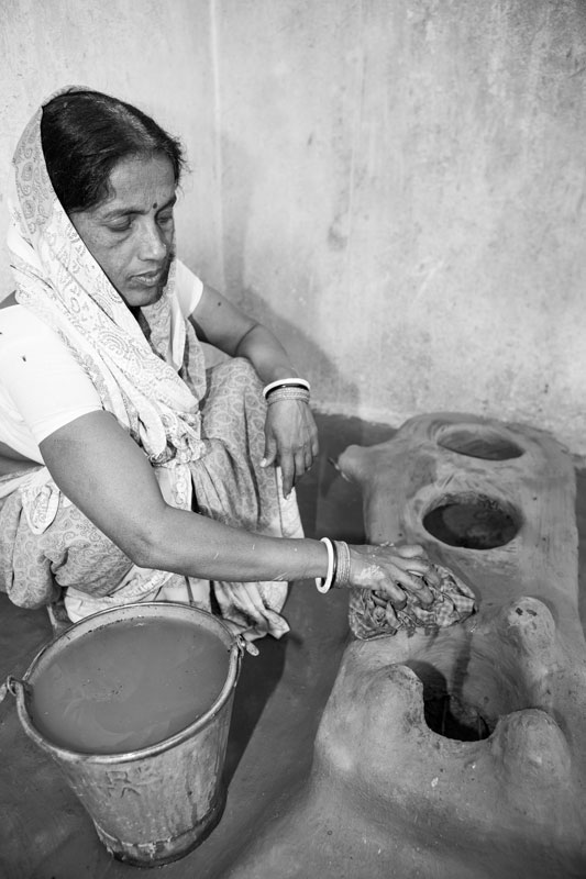 Women and Water Needs from Gender Perspective - Cleaning and sanitizing mud hearth in Bhojpur district, Bihar